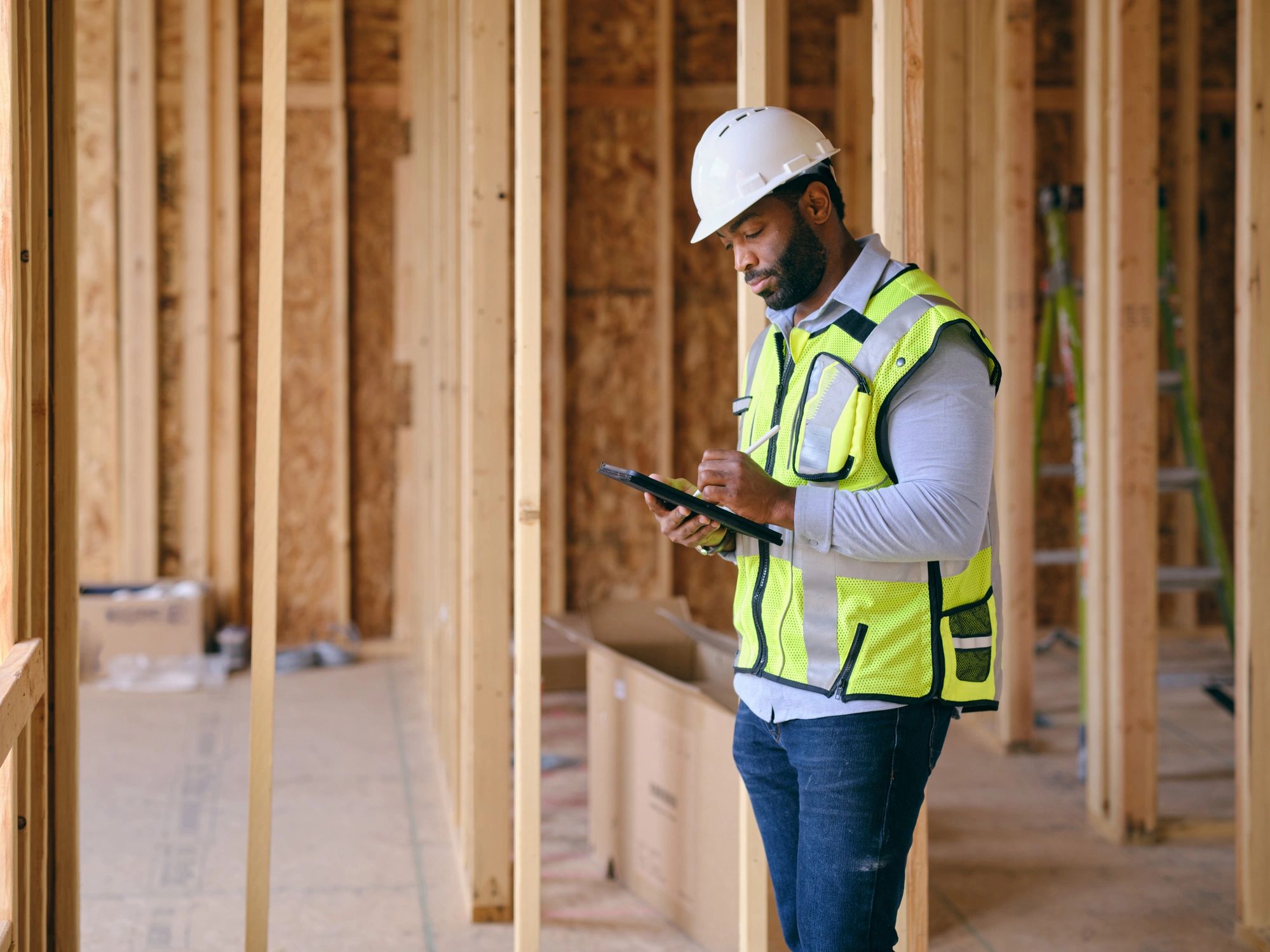 Man in safety vest and helmet